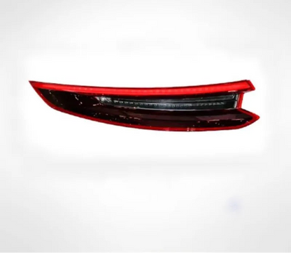Red LED driving light on a white background